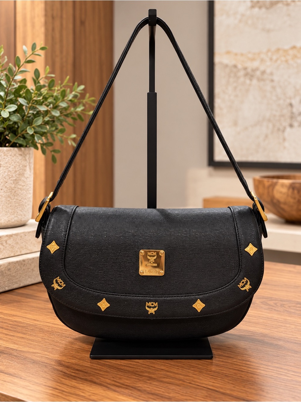 MCM Black Leather Vintage Shoulder Bag with Gold Accents
